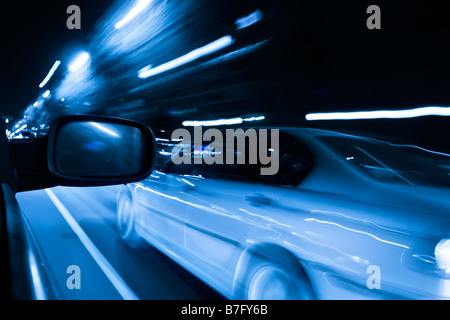 Blurred action at night from car Stock Photo