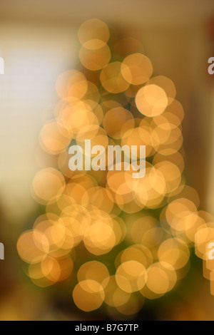 Defocused Christmas tree with lights Stock Photo