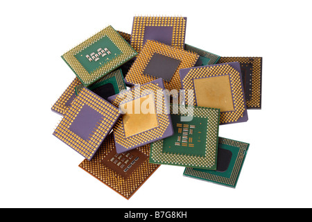 Pile of computer processor chips cut out on white background Stock Photo