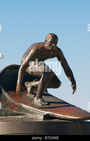 Statue of surfer Tim Kelly Hermosa Beach pier on the strand California Stock Photo