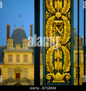 Emperor Napoleon the first coat of arms on entrance's railing of Chateau de Fontainebleau castel France Europe Stock Photo
