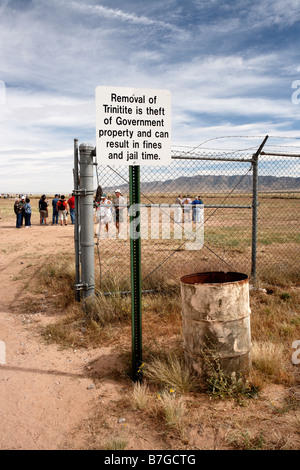 A US government sign at the entrance to Trinity Site, New Mexico, warns visitors that removal of Trinitite is illegal. Stock Photo