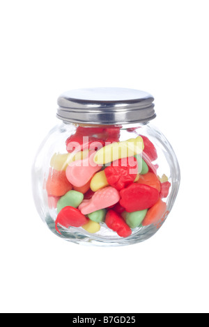 Colorful candies in the glass jar isolated on white background Stock Photo