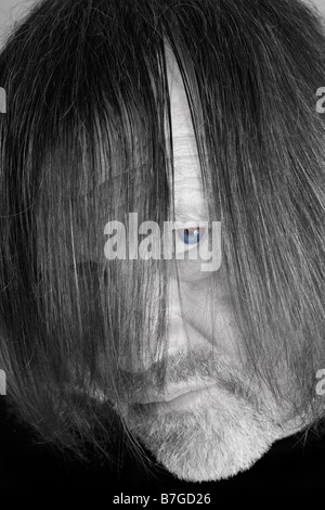 Long Haired Middle Aged Man Stock Photo