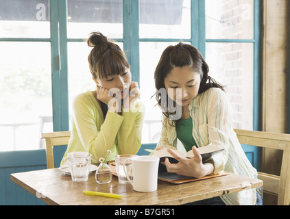 Young girls talking each other Stock Photo