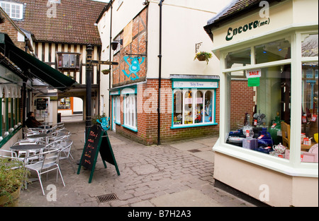 Old Swan Yard an alleyway of boutique shops and cafes in the typical English market town of Devizes Wiltshire England UK Stock Photo