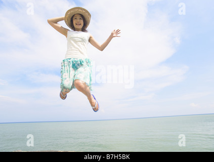 Woman at seashore Stock Photo