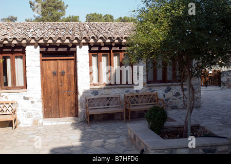 Women monastery cells and inner garden in Aiga Napa region Stock Photo