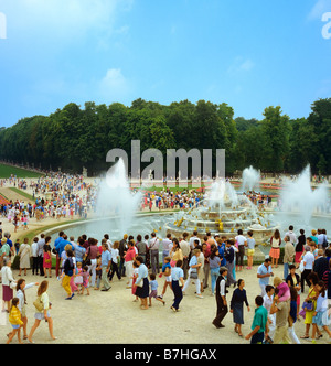 Latona basin with fountain and tourists during big waters play Chateau de Versailles France Stock Photo