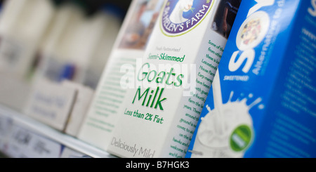 Goat's milk soy milk and other alternatives for sale in supermarket UK Britain Stock Photo