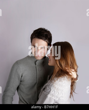 couple in love holding and smiling isolated on white Stock Photo