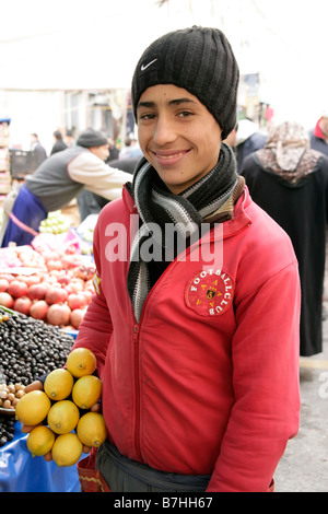 Young Turkish boy who is a market trader in Istanbul, Turkey Stock Photo