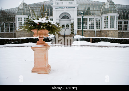 A potted plant stands in front of the Franklin Park Conservatory Stock Photo