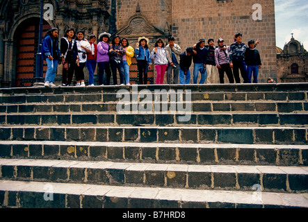 Peruvian students on student field trip to the Cathedral in the Plaza de Armas in the city of Cuzco Peru Stock Photo