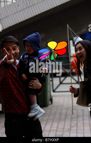 Happy Chinese Family walking with Child on Chinese New Year in CHina Stock Photo