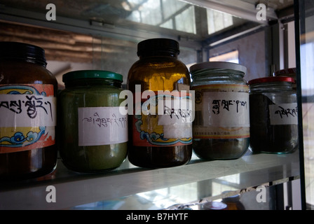 Glasses of Tibetan medicine in Village doctors office. Stock Photo