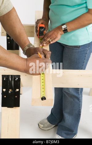 African American Couple Doing Home Improvement, B.C. Stock Photo
