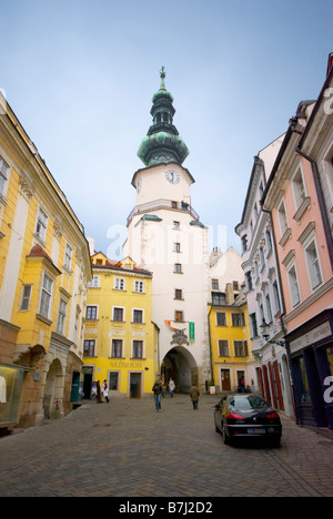 Pedestrian street Michalska leads up to St Michael’s Gate and St Michael’s Tower in the Old Town of Bratislava, Slovakia. Stock Photo