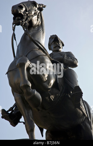 A memorial statue to King Edward VII 1841-1910 by Bertram MacKennal. The statue is located in Waterloo Place, London, England. Stock Photo