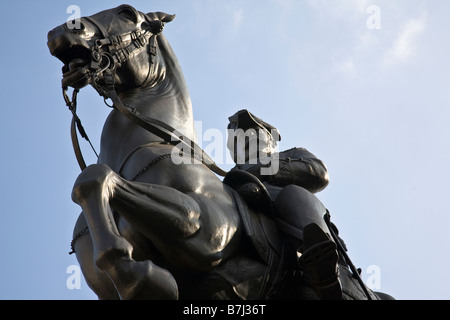 A memorial statue to King Edward VII 1841-1910 by Bertram MacKennal. The statue is located in Waterloo Place, London, England. Stock Photo