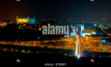 Bratislava by night seen from futuristic restaurant UFO. Bratislava Castle, St Martin’s Cathedral and the Novy Most bridge (SNP) Stock Photo