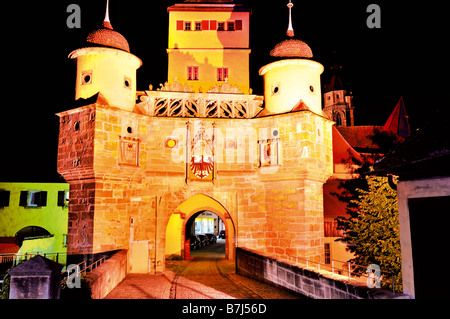 Nocturnal iluminated medieval town gate Ellinger Tor in Weissenburg Bavaria Stock Photo