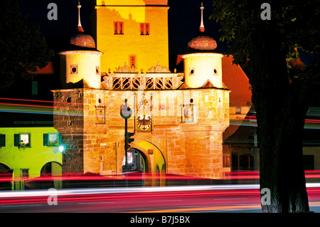 Nocturnal iluminated medieval town gate Ellinger Tor in Weissenburg Bavaria Stock Photo