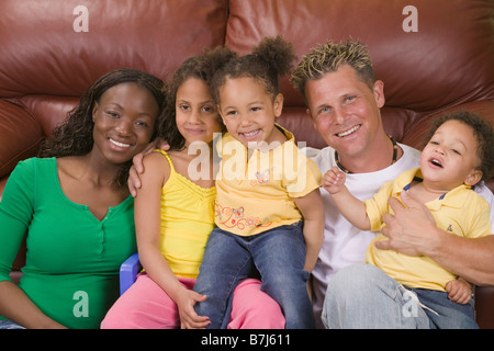 AA mom, Caucasian dad, Mulatto Children, Boy 1.5 years, girl 3 years, girl 6 years. Stock Photo