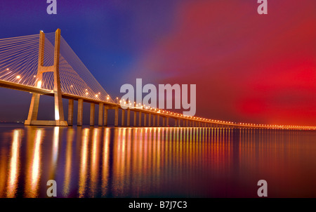 Night ilumination at the Vasco da Gama Bridge in Lisbon Stock Photo
