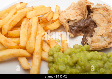 Chips meat pie and mushy peas Stock Photo