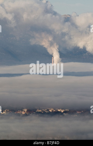 The town of Megalopoli shrouded in fog, and smog from the local power stations, Arcadia peloponnese, greece Stock Photo