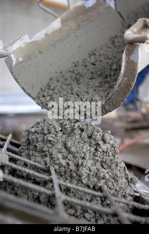 Cement pouring out of mixer; Canada, Ontario, Hamilton (Composting Facility) Stock Photo