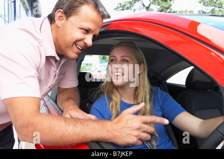 Teenage Girl Learning How To Drive Stock Photo