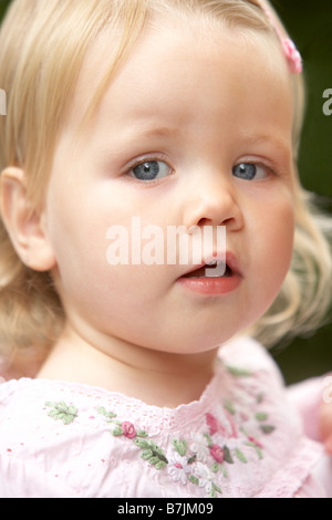Baby girl outdoors, portrait Stock Photo - Alamy
