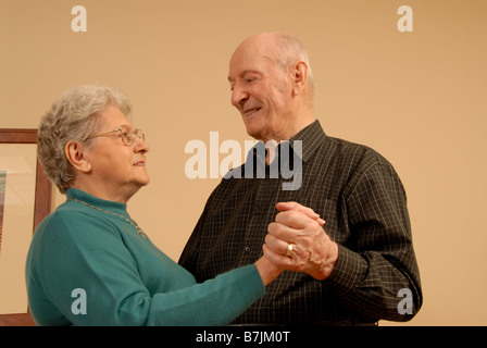 Senior Couple Dancing; Canada, Saskatchewan, Regina Stock Photo