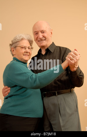 Senior Couple Dancing; Canada, Saskatchewan, Regina Stock Photo