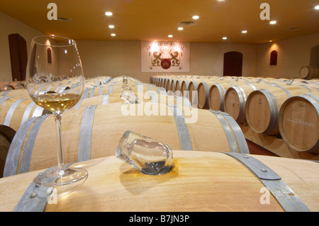 glass bung stoppers on barrels fermenting must white wine chateau fieuzal pessac leognan graves bordeaux france Stock Photo