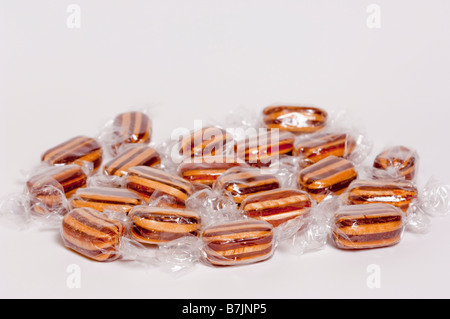 A few humbug boiled sweets shot on a white background Stock Photo