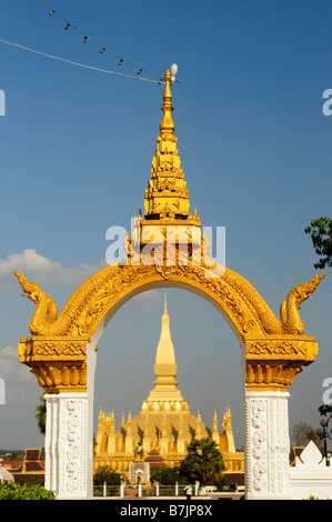 Entrance gateway to pha tat lunag temple in vientiane. Laos Stock Photo