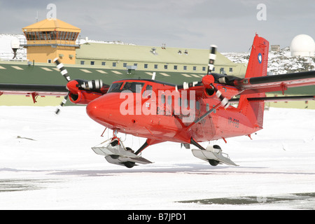 Twin Otter skiplane taking off from the British Antarctric Survey base at Rothera, Antarctica Stock Photo