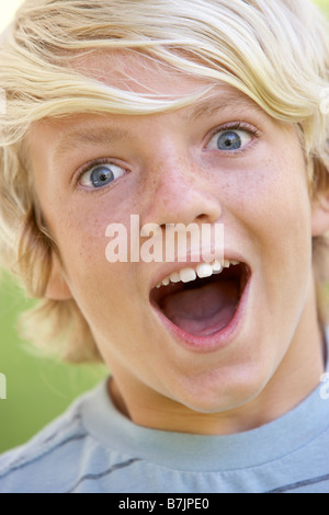 Portrait Of Teenage Boy Looking Excited Stock Photo