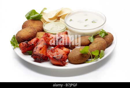 plate of indian asian party snacks Stock Photo