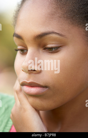 Portrait Of Teenage Girl Looking Upset Stock Photo