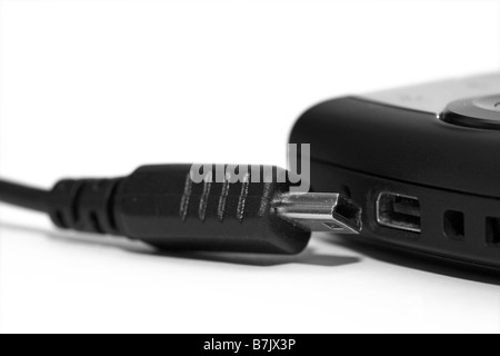 mobile phone with mini usb plug and cable Stock Photo