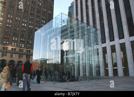 Customers entering and leaving the Apple Store on Fifth Avenue New York City, New York Stock Photo