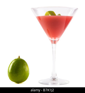 Red cosmopolitan cocktail with lime in martini glass, on white marble ...