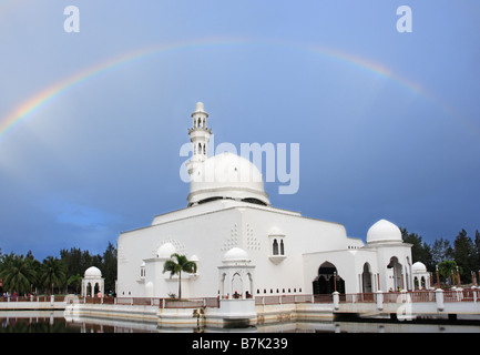 Rainbow over Tengku Tengah Zaharah Mosque, also popularly known as the Floating Mosque in Kuala Terengganu, Malaysia Stock Photo