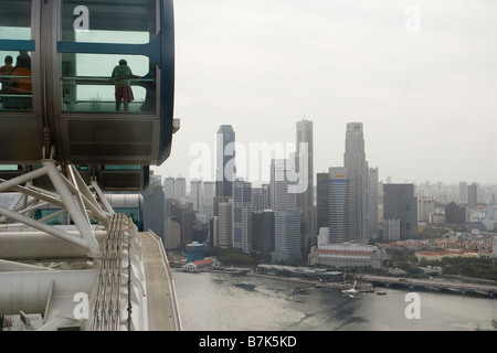 Passengers are seen in a capsule on the Singapore Flyer in Singapore Stock Photo