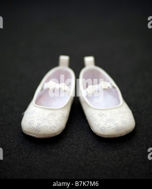 A baby's first pair of shoes Stock Photo