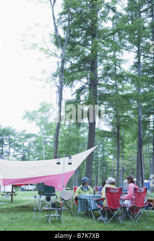 Group of Young People on Camping Vacation Stock Photo